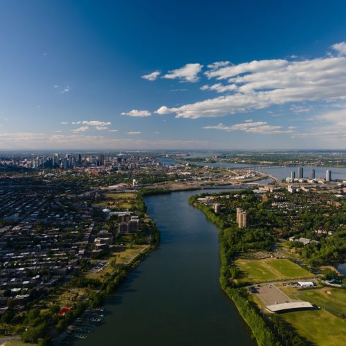 The aerial landscape view of Saint Lawrence River and the city of Montreal, Canada